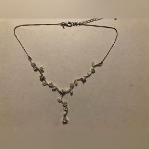 Silver rhinestone necklace.